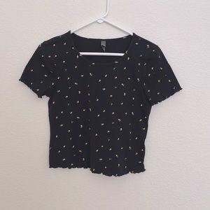 Black baby T with a little lemon pattern